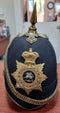 SB29 The East Kent Regiment Victorian Blue Cloth Helmet. Helmet plate original to helmet. Silk lining showing some wear but still attached. Complete with leather backed chin chain.