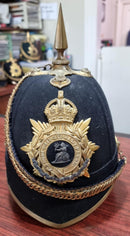 SB23 A good Norfolk Regiment Blue cloth helmet. KC helmet plate original to the helmet. Good silk liner and complete with velvet lined chin chain.