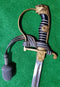 A Quality German WW2 Cavalry Officers Sword by Eickhorn Model Nr 1312. Leopard head pommel with ruby eyes. Complete with portepee and painted black scabbard.