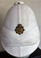 A Rare white Cloth State of Victoria Colonial 6 panel Pith Helmet complete with badge for the Victorian Military Forces which is original to the helmet. - SOLD