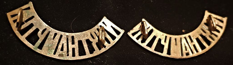 PAIR OF NORTHAMPTON REGIMENT SHOULDER TITLES