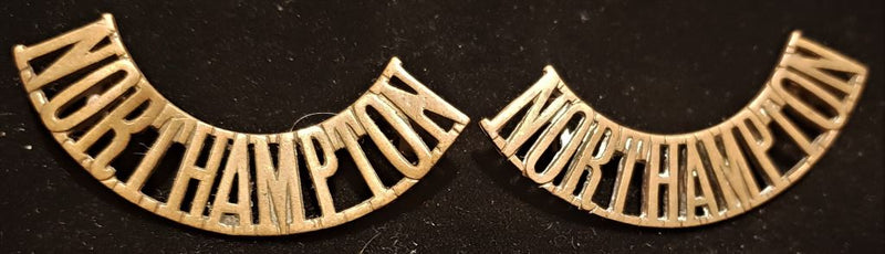 PAIR OF NORTHAMPTON REGIMENT SHOULDER TITLES