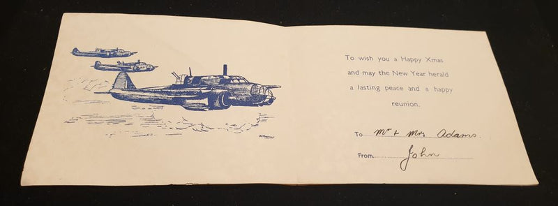 R.A.A.F. Greetings from Group 623 British New Guinea  Christmas and New Year card 1944-45. Signed “To Mr & Mrs Adams from John”