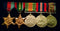 Five: 1939/45 Star, Pacific Star, Defence Medal, War Medal and Australian Service Medal. All medals correctly named to QX20158 S. A. CREED - VF SOLD