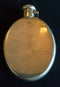 Hallmarked (1915) silver nurses hip flask engraved “L. D. Meares 6th L. H. RGT. A.I.F.”  Sister Louisa Devenish Meares saw most of her service in Salonika with a brother (Charles Dycester Devenish Meares) serving with the 6th Light Horse. - SOLD