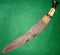 Kukri of the Kothimoda type. Circa 1850. Bone handle and clean blade mounted in a superb worked scabbard.  - SOLD.