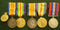 FAMILY GROUP : Pair: British War Medal and Victory Medal impressed to 3043 Pte. E. A. Beagley 12 Bn. AIF - SOLD