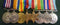 Eight: Military Medal, British War Medal and Victory Medal all correctly impressed to 2228 PTE F. ROBERTSON 58 BN. A.I.F. - VF SOLD